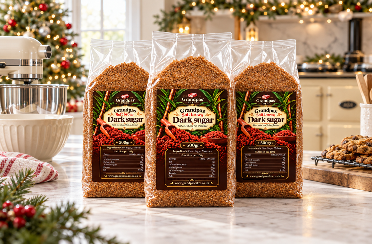 500gr packs of soft dark brown sugar for baking on the kitchen worksurface