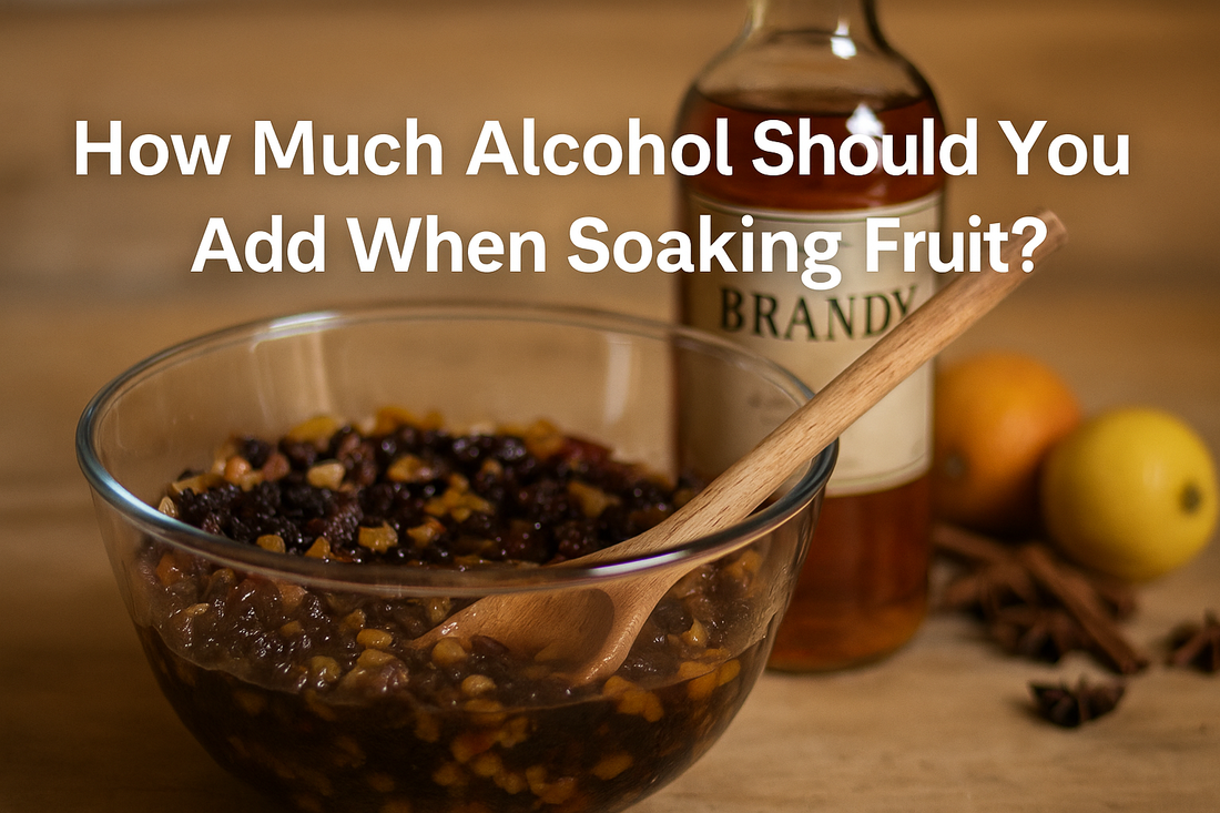 Mixed dried fruit soaking in glass bowl with brandy bottle behind Table showing measuring jug and bag of Grandpa’s Mixed Fruit Wooden spoon stirring soaked fruit beside Christmas baking tools
