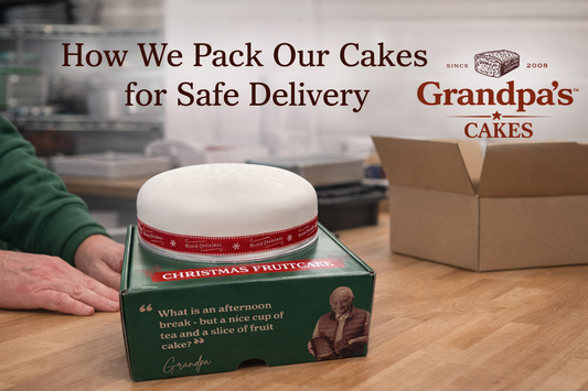 Handmade iced fruit cake being prepared for safe delivery at Grandpa’s Cakes