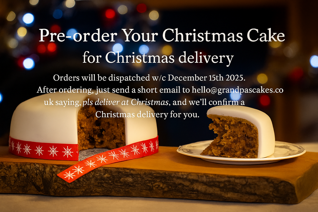 Handmade iced Christmas fruit cake on a rustic wooden board with festive lights and a slice served on a plate, promoting pre-orders for Christmas delivery.