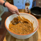 When Grandpas cake mix ingredients are all combined the flour will have absorbed into the mixture, all that remains is to add the fruit cake batter into the cake tin and bake.