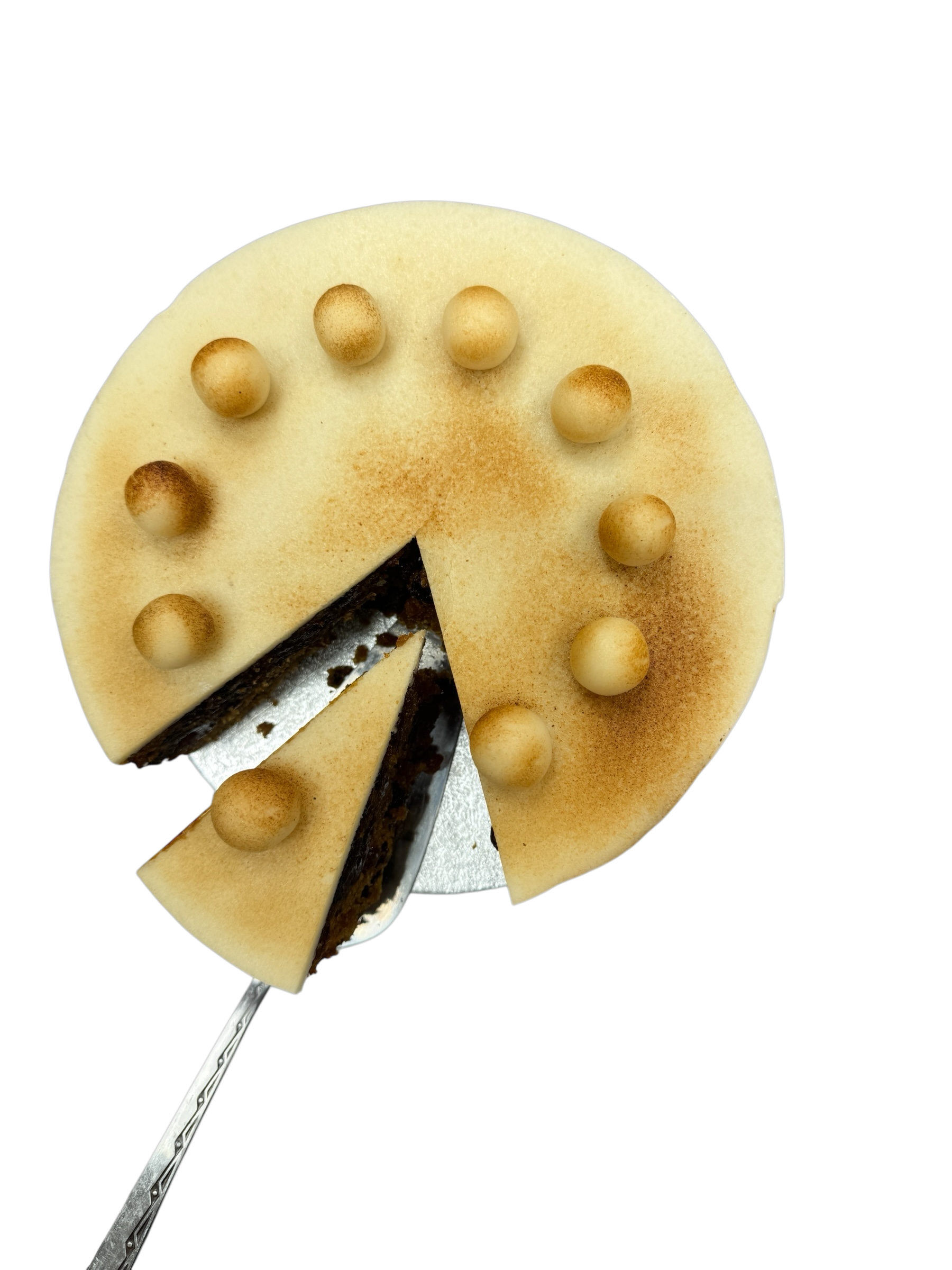 Traditional Simnel cake with golden marzipan balls