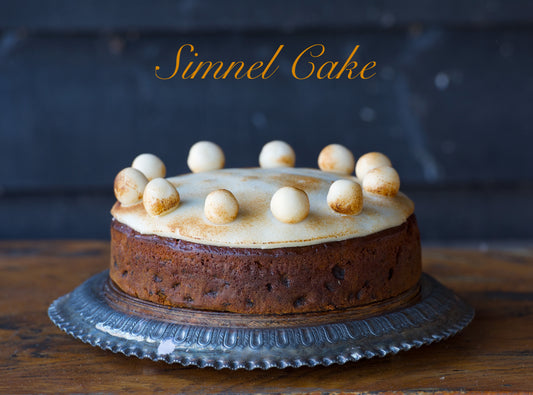 Traditional Easter Simnel fruit cake with marzipan balls handmade in the UK