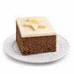 Small square celebration fruit cake topped with marzipan and icing