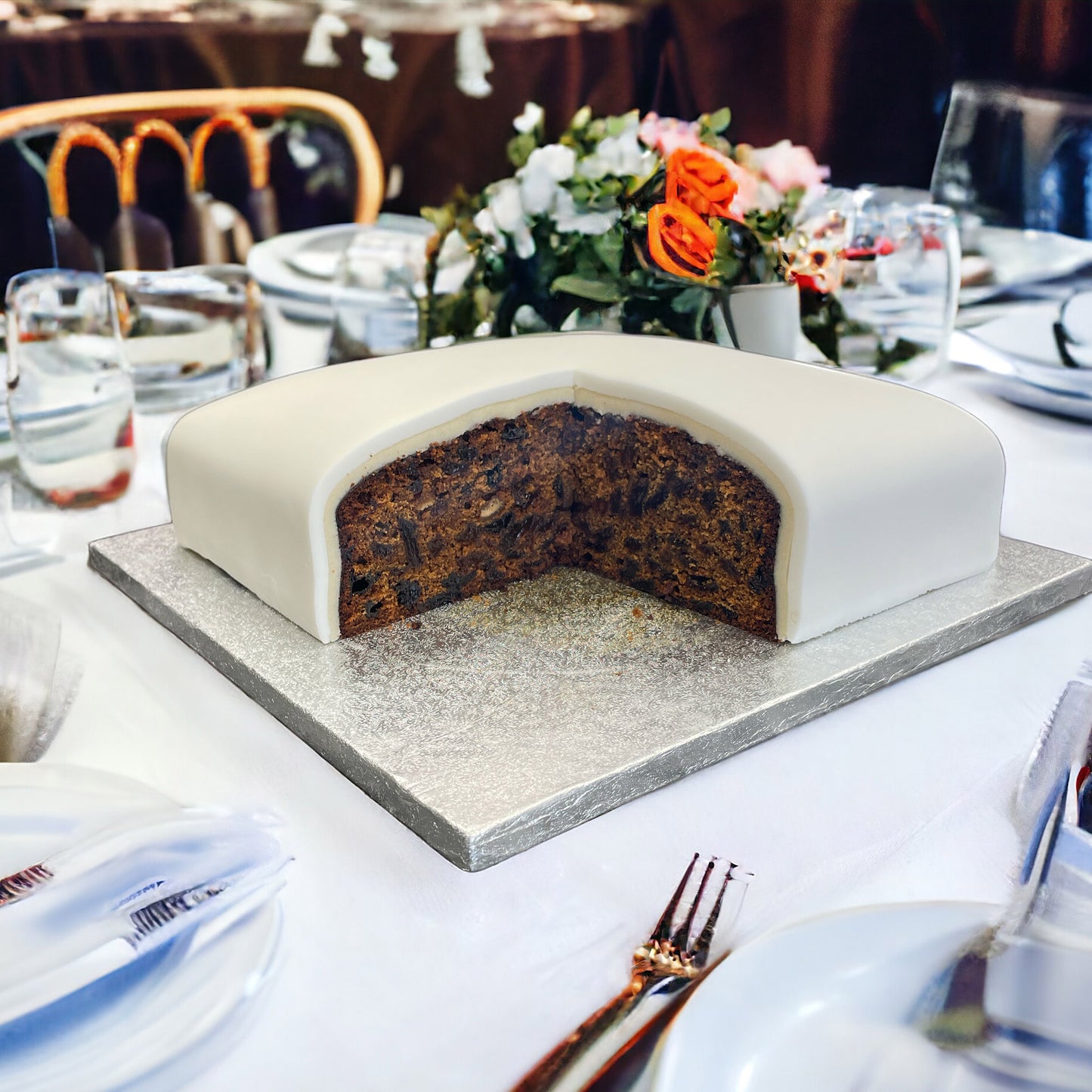 Wedding fruit cake, brandy or rum soaked fruit, with marzipan and icing,  4 tier cakes, 12 inch, 10 inch and 8 inch. Sliced Wedding Cake