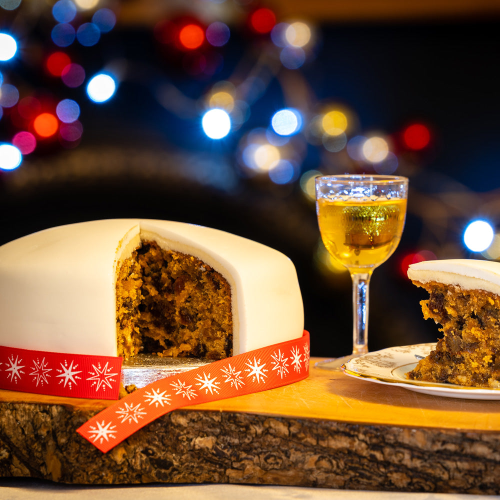 Grandpas Christmas Cake, with a slice on a plate.